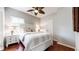 Charming bedroom with wood floors, and neutral tones creating a serene and inviting atmosphere at 5728 Williams Rd, Norcross, GA 30093