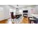 Modern dining room with elegant lighting fixture at 5728 Williams Rd, Norcross, GA 30093