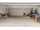 Spacious garage area with concrete floors, ample storage space, and room for multiple vehicles at 5728 Williams Rd, Norcross, GA 30093
