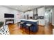 Open kitchen with a center island and bar stool seating at 5728 Williams Rd, Norcross, GA 30093