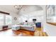 Open-concept living room with hardwood floors and a comfortable sectional sofa at 5728 Williams Rd, Norcross, GA 30093