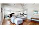 Spacious living area with hardwood floors connecting to dining and kitchen at 5728 Williams Rd, Norcross, GA 30093