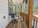 Inviting porch with stylish chairs, providing a cozy outdoor space with views of the surrounding nature at 5728 Williams Rd, Norcross, GA 30093