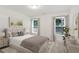 Cozy bedroom with neutral colors, plush bedding, and ample natural light at 1245 Ladd Sw St, Atlanta, GA 30310