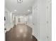 Bright entryway with hardwood floors and white wainscoting, leading to the main living areas at 1245 Ladd Sw St, Atlanta, GA 30310