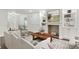 Comfortable living room with a fireplace, built-in bookshelves, and stylish furnishings at 1245 Ladd Sw St, Atlanta, GA 30310
