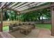Cozy outdoor patio with pergola and comfortable seating area, great for entertaining at 1245 Ladd Sw St, Atlanta, GA 30310