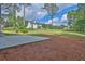 Expansive backyard with a concrete patio area, ideal for entertaining or relaxing outdoors at 145 Millennial Ct, Lawrenceville, GA 30045