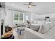 Spacious living room with hardwood floors, recessed lighting, and a cozy fireplace at 145 Millennial Ct, Lawrenceville, GA 30045