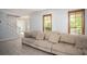 Bright living room with a comfortable sofa and attractive flooring at 2889 Carrousel Ct, Stone Mountain, GA 30087