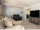 Spacious living area with modern furniture and neutral decor at 2889 Carrousel Ct, Stone Mountain, GA 30087