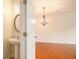 A modern chandelier hangs above this beautiful powder room at 5621 Cobblestone Creek Ave # 14, Mableton, GA 30126