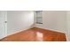 Bedroom with hardwood floors and a window at 5621 Cobblestone Creek Ave # 14, Mableton, GA 30126