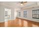 Spacious main bedroom boasts hardwood floors and tray ceilings at 5621 Cobblestone Creek Ave # 14, Mableton, GA 30126