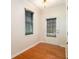 Bright entryway with hardwood floors, a window with blinds, and a door with a window leading to the outside at 5621 Cobblestone Creek Ave # 14, Mableton, GA 30126