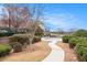 Community pool features a covered surface, sidewalk, landscaping, and a clubhouse at 5621 Cobblestone Creek Ave # 14, Mableton, GA 30126