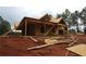 Exterior view of a two-story home under construction, featuring wood framing and an incomplete lawn at 578 Price Rd, Carrollton, GA 30116