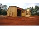 An exterior view of the new home under construction showing the exterior framing at 578 Price Rd, Carrollton, GA 30116