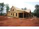 An exterior view of the new home under construction showing the exterior framing at 578 Price Rd, Carrollton, GA 30116