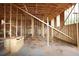 Interior framing of home with wood beams, stud walls, and the infrastructure for future living spaces at 578 Price Rd, Carrollton, GA 30116