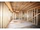 An interior view of the new home under construction showing the wood frame and window openings at 578 Price Rd, Carrollton, GA 30116