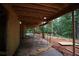 A view of the new home under construction showing the patio, wood frame and view to yard at 578 Price Rd, Carrollton, GA 30116