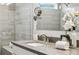 Elegant bathroom vanity with gray countertop, modern fixtures, and stylish decor at 1174 City Park Ln, Decatur, GA 30033