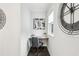 Small home office area with a desk and chair, illuminated by a window at 1174 City Park Ln, Decatur, GA 30033
