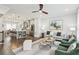 Open floor plan featuring a living room, kitchen with island, and dining area at 1174 City Park Ln, Decatur, GA 30033