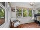 Cozy and bright office nook featuring large windows and a comfortable chair at 2180 Howell Mill Nw Rd, Atlanta, GA 30318