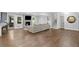 Basement living area with cozy fireplace, stylish décor, and access to stairs, creating a versatile space at 2445 Kings Point Dr, Dunwoody, GA 30338