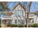 Inviting condo with large windows and a covered porch, perfect for enjoying the outdoors at 303 Gettysburg Pl, Atlanta, GA 30350