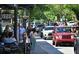 Bustling street scene with pedestrian and vehicular traffic on a sunny day at 303 Gettysburg Pl, Atlanta, GA 30350