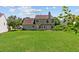 Expansive backyard with lush green grass and ample space for outdoor activities at 3234 Baymount Way, Lawrenceville, GA 30043