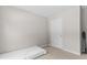 Neutral bedroom featuring wall-to-wall carpet and a door at 3234 Baymount Way, Lawrenceville, GA 30043