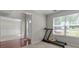 Bright room featuring hardwood floors, a decorative front door and ample natural light at 3234 Baymount Way, Lawrenceville, GA 30043