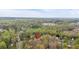 Aerial view of the property nestled in a wooded neighborhood, showcasing its tranquil and private setting at 3640 Silver Leaf Sw Ln, Marietta, GA 30008