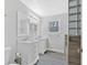Bright bathroom with double vanities, mirrors, and ample lighting for a luxurious feel at 3640 Silver Leaf Sw Ln, Marietta, GA 30008