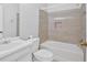 Bathroom featuring tile surround tub and shower, and vanity with sink at 3640 Silver Leaf Sw Ln, Marietta, GA 30008