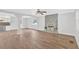 Spacious living room with wood-look tile floors, stone fireplace, and lots of natural light at 3640 Silver Leaf Sw Ln, Marietta, GA 30008