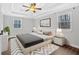 Stylishly furnished main bedroom features natural light, neutral tones, and modern decor at 3640 Silver Leaf Sw Ln, Marietta, GA 30008