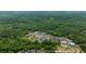An aerial perspective showcasing the community and natural surroundings of 11277 Serenbe Ln at 11277 Serenbe Ln, Chattahoochee Hills, GA 30268