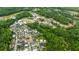 An aerial view capturing the landscape and neighborhood surrounding 11277 Serenbe Ln at 11277 Serenbe Ln, Chattahoochee Hills, GA 30268