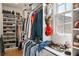 This closet is neatly organized and has natural light from a window at 11277 Serenbe Ln, Chattahoochee Hills, GA 30268