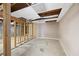 Unfinished basement with exposed ceiling, concrete floors, and framed walls at 4651 Palm Dr, Douglasville, GA 30135