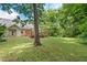 Expansive backyard with wooden deck perfect for outdoor entertaining and enjoying the serenity of nature at 1062 Sasha Ln, Roswell, GA 30075