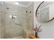 This tile shower offers safety bars and a bench, blending function and style at 1062 Sasha Ln, Roswell, GA 30075
