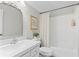 Bright bathroom featuring modern sink and vanity and a shower/tub combination at 1062 Sasha Ln, Roswell, GA 30075