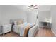 A cozy bedroom featuring a dedicated workspace and streamlined decor for focus and relaxation at 1062 Sasha Ln, Roswell, GA 30075