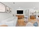 Open floor plan features new lighting and flows into kitchen and dining areas at 1062 Sasha Ln, Roswell, GA 30075
